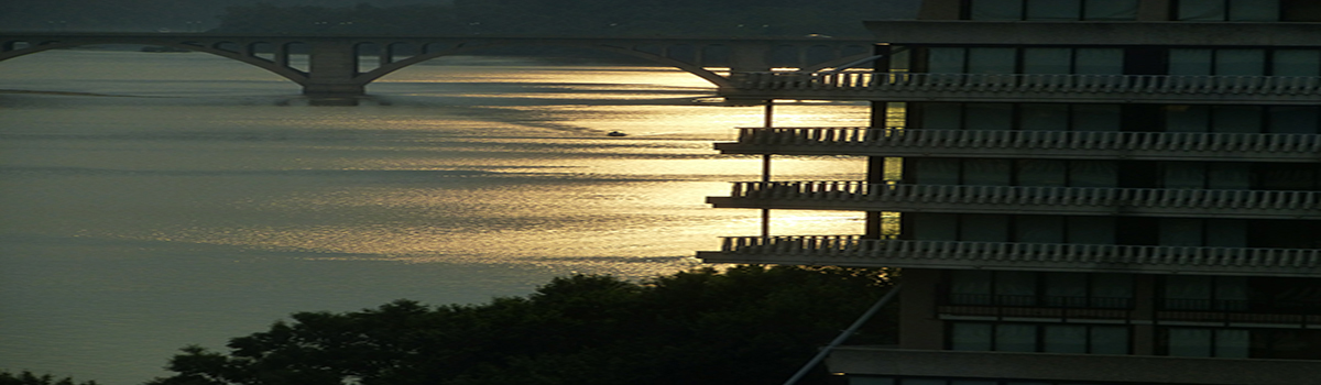 Watergate East Potomac River sunset through Key Bridge