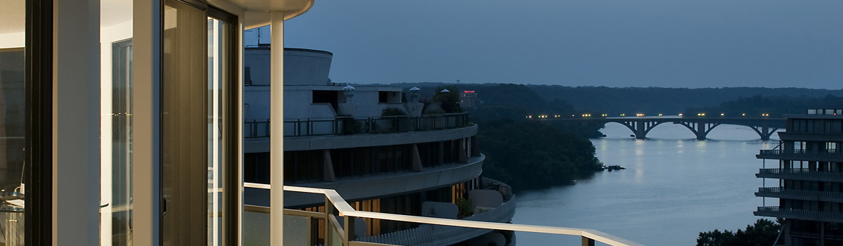 Watergate East looking west up Potomac River night to Key Bridge